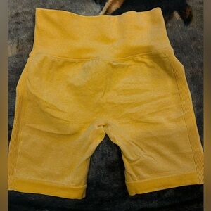 Orange medium booty scrunch shorts from SHEIN
